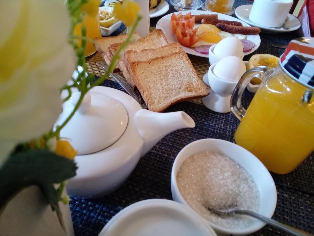 White House Ella Hotel Bagian luar foto